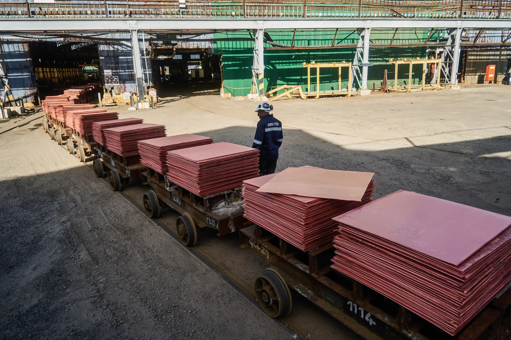 Copper plates on wagons ready for shipping at a&nbsp;refinery&nbsp;in Mufulira, Zambia.