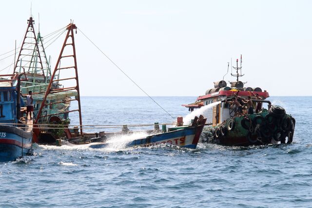 Indonesian authorities sink an impounded Vietnamese fishing boat near Datuk island in West Kalimantan in May 2019.