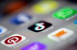 A photo taken on December 14, 2018 in Paris shows the logo of the application TikTok.