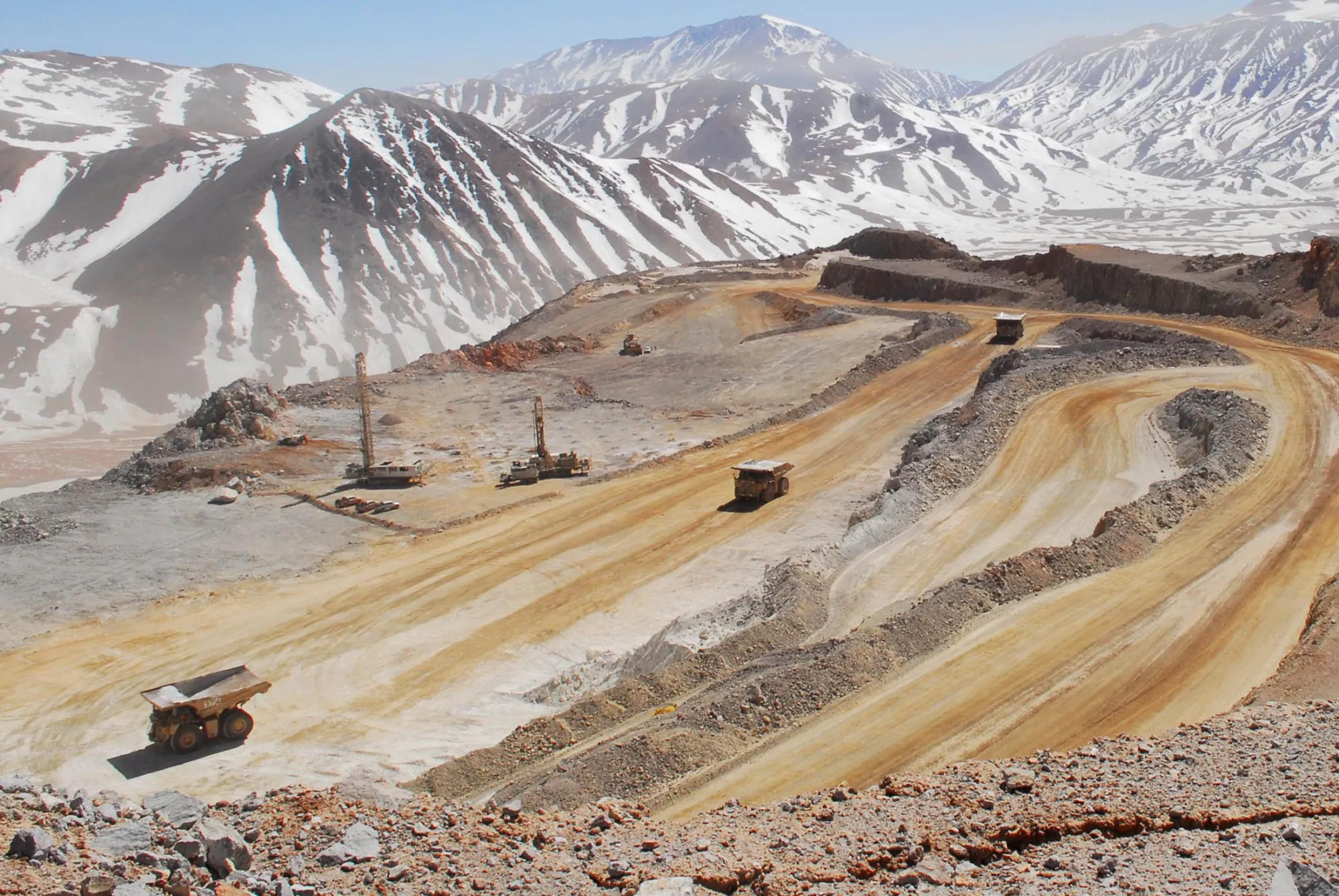 Mining trucks weave through Barrick Gold Corp.'s Veladero mine in the San Juan province of Argentina, on Tuesday, Oct. 16, 2007.