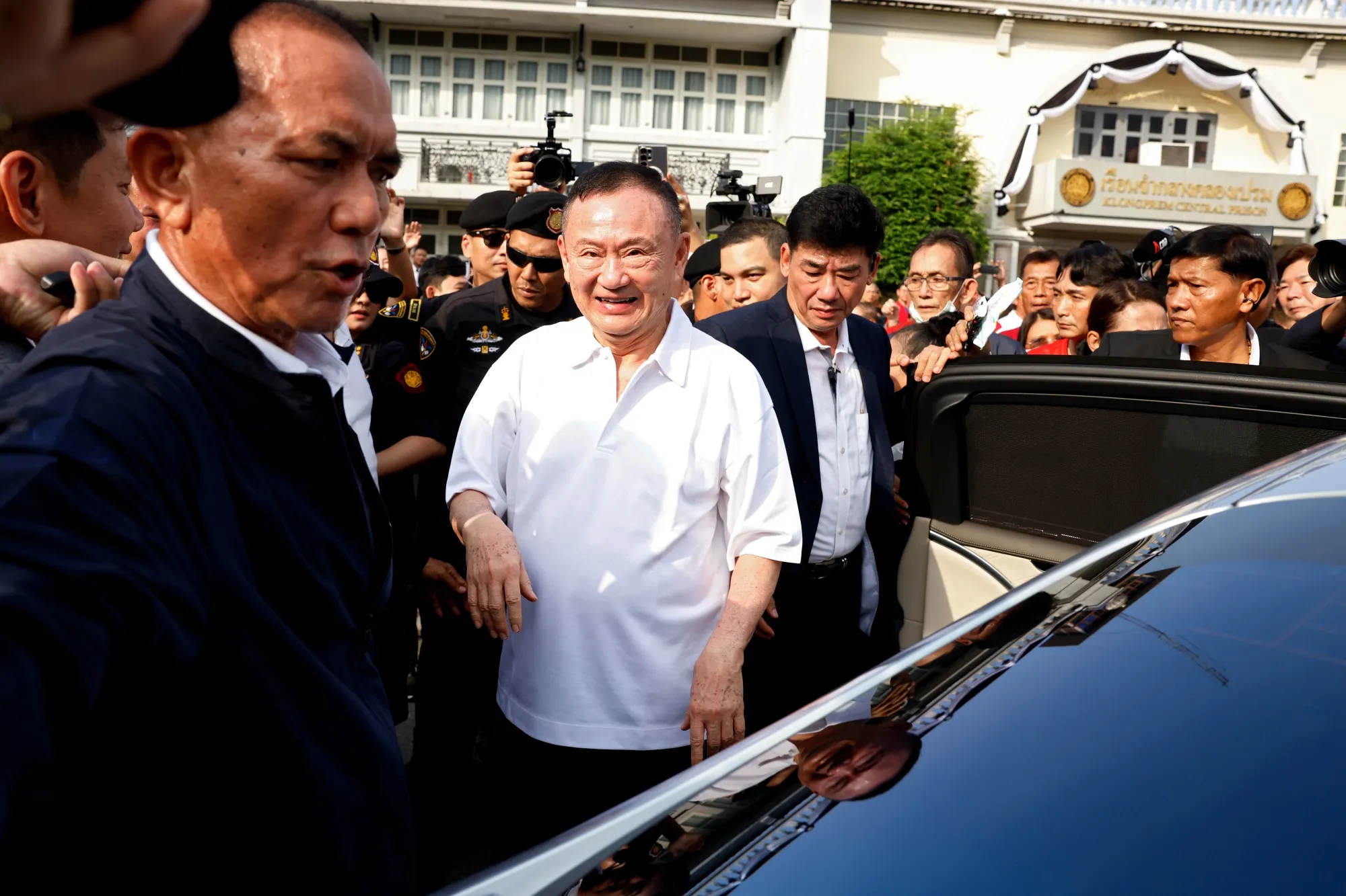 Thaksin Shinawatra departs from Klong Prem Central Prison in Bangkok on May 11.