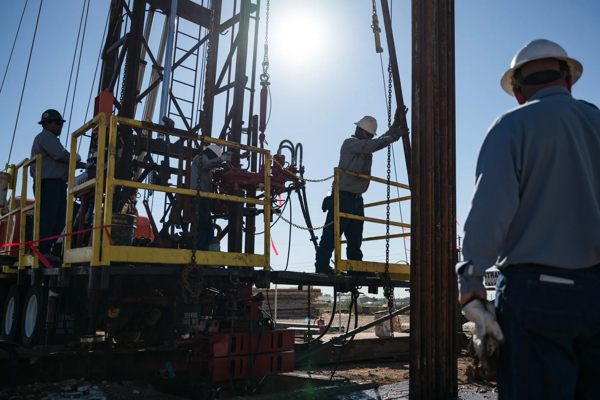 An oilfield crew works at a service rig&nbsp;in Midland, Texas.