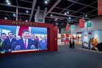 A screen showing a video featuring Xi Jinping at an exhibition in Hong Kong on June 22.