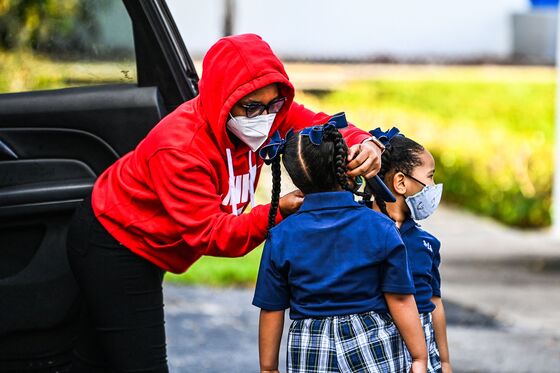 Tiny Masks Are Scarce as Unboosted Kids Return to Classrooms