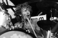 Cream drummer Ginger Baker performing live onstage.