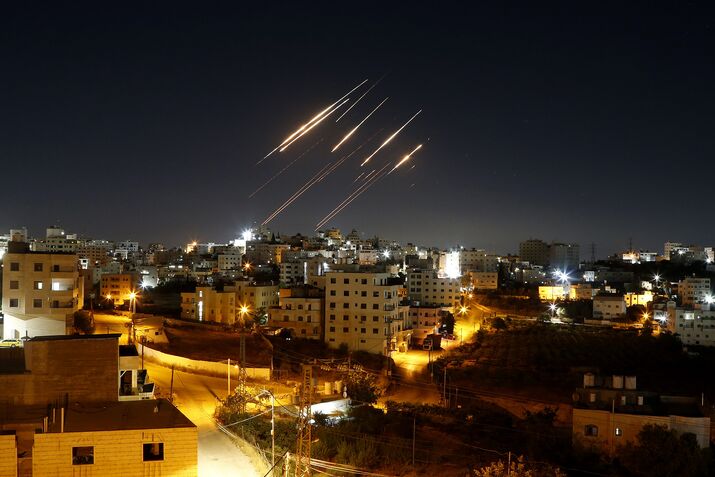 Iranian ballistic missiles illuminate night sky over Hebron, West Bank