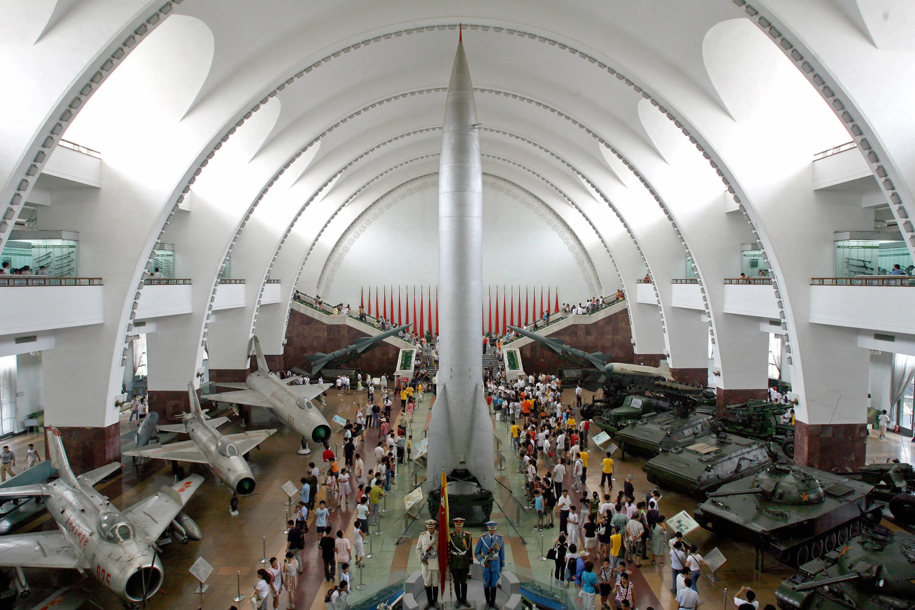 Visitors walk past China's first nuclear missile on display at the Military Museum in Beijing.