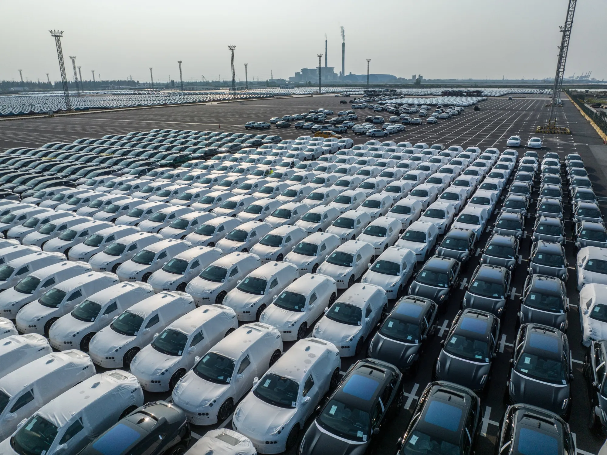 Electric vehicles bound for shipment at the Port of Taicang in China.