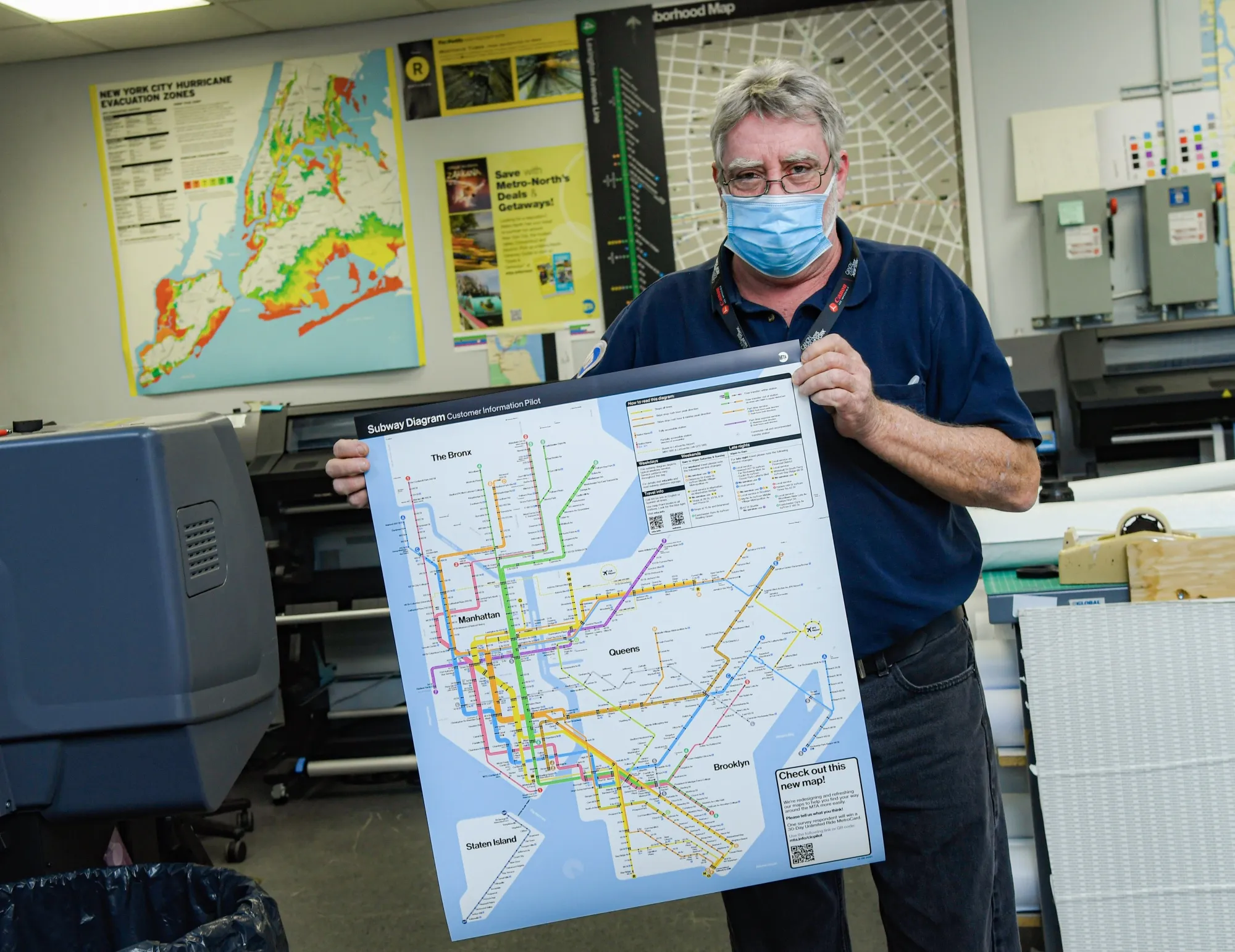 At the MTA print shop, Patrick McDermott shows off a newly reissued version of Massimo Vignelli’s famed 1972 New York City subway map.&nbsp;