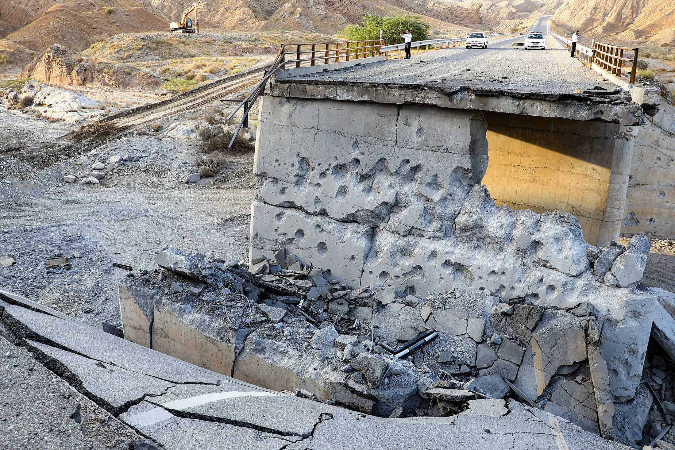 A damaged bridge, reportedly hit following a US strike, in southern Iran on July 18, in a photo released by Iran's ISNA news agency.