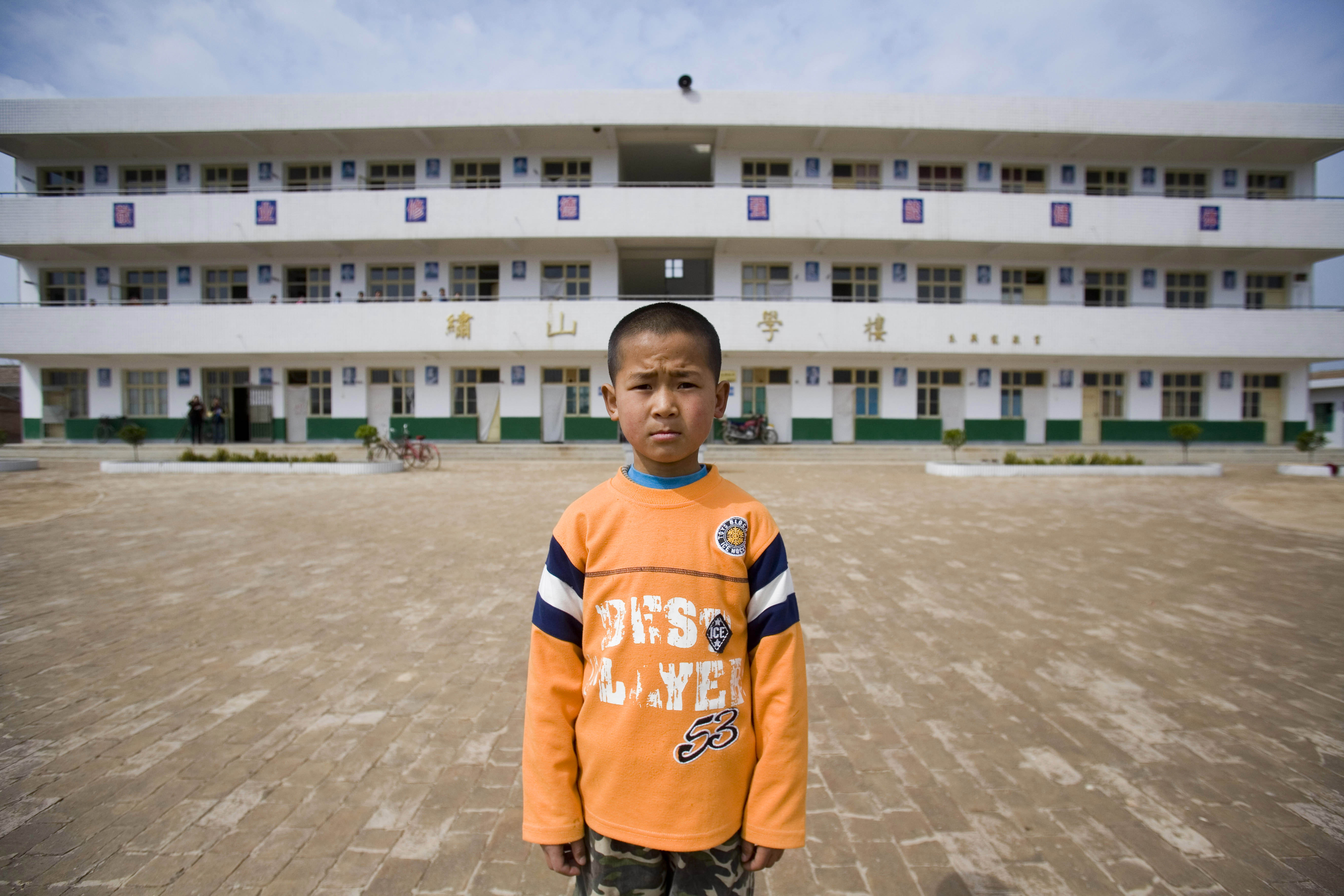 Liu Shi, whose parents have moved to Hangzhou to be migrant workers, at his school in Chunhua county in Shanxi Province, April 14, 2008.
