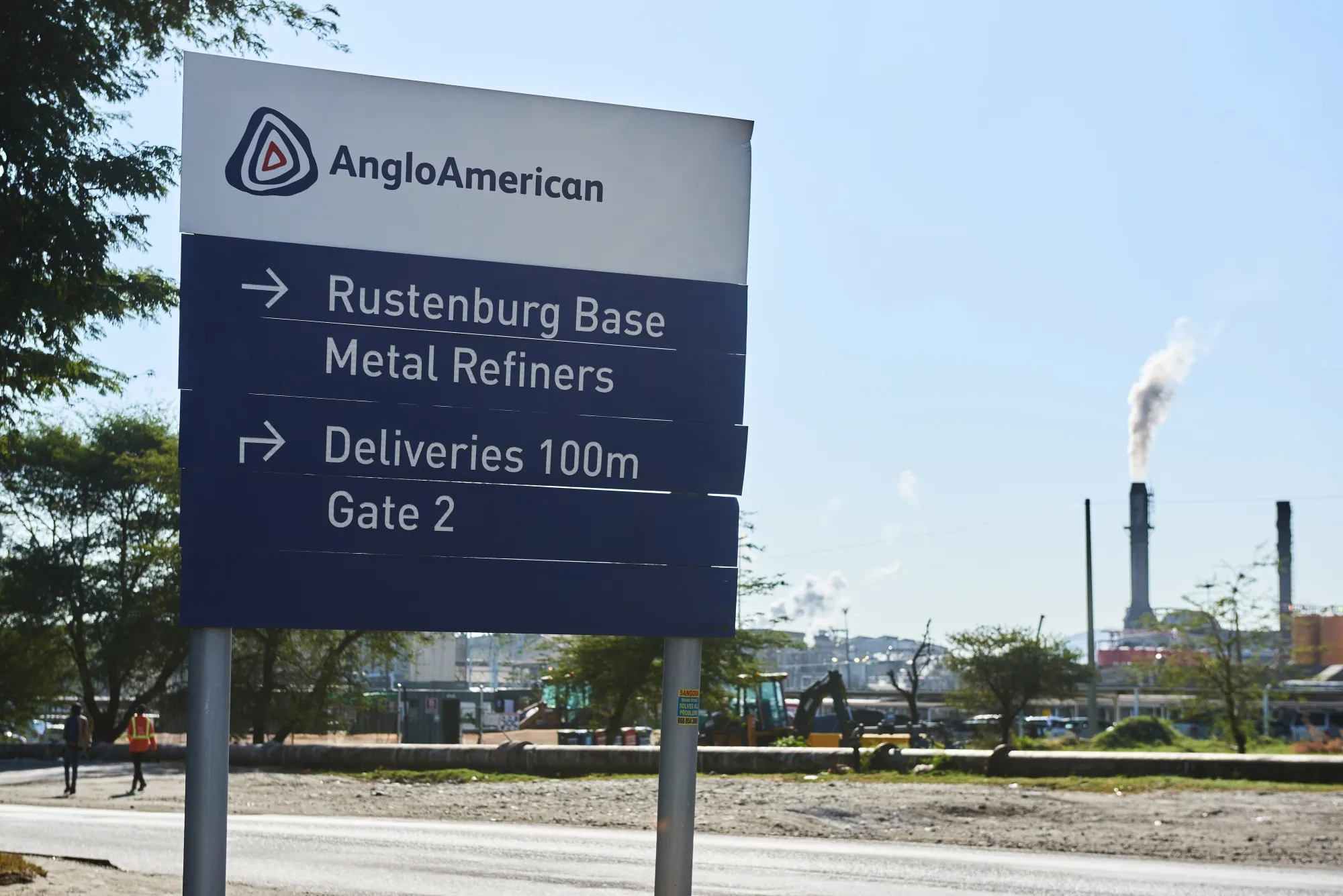 A sign for directions to the Rustenburg base metal refiners at the Waterval smelter, operated by Anglo American Platinum Ltd., outside Rustenburg, South Africa