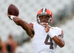 Deshaun Watson of the Cleveland Browns warms up prior to a game in Jacksonville, Florida on Aug. 12, 2022.