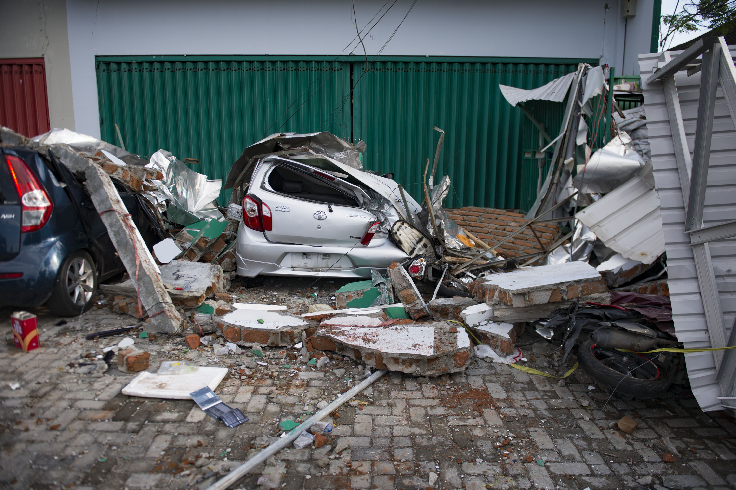 Damaged cars in Palu, Sulawesi on Sept. 30