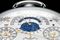 A sky chart customized to the owner's home city sits at top of back dial.