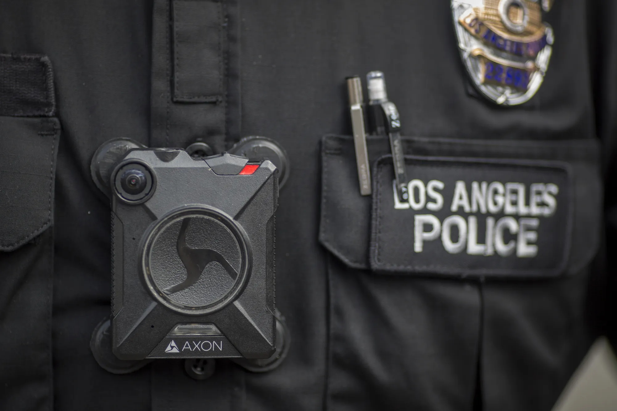 A Los Angeles police officer wear an Axon body camera.