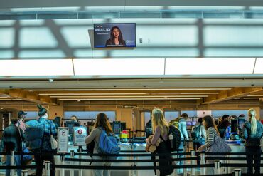 Travelers At DCA Airport Ahead Of Thanksgiving Holiday