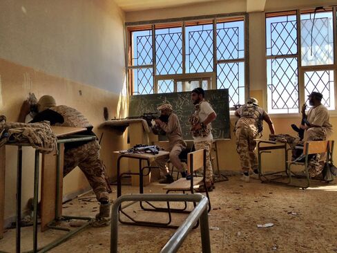 Members of the Misrata-led 604 Brigade operate out of an abandoned school on the frontlines in the battle against Islamic State in Sirte.