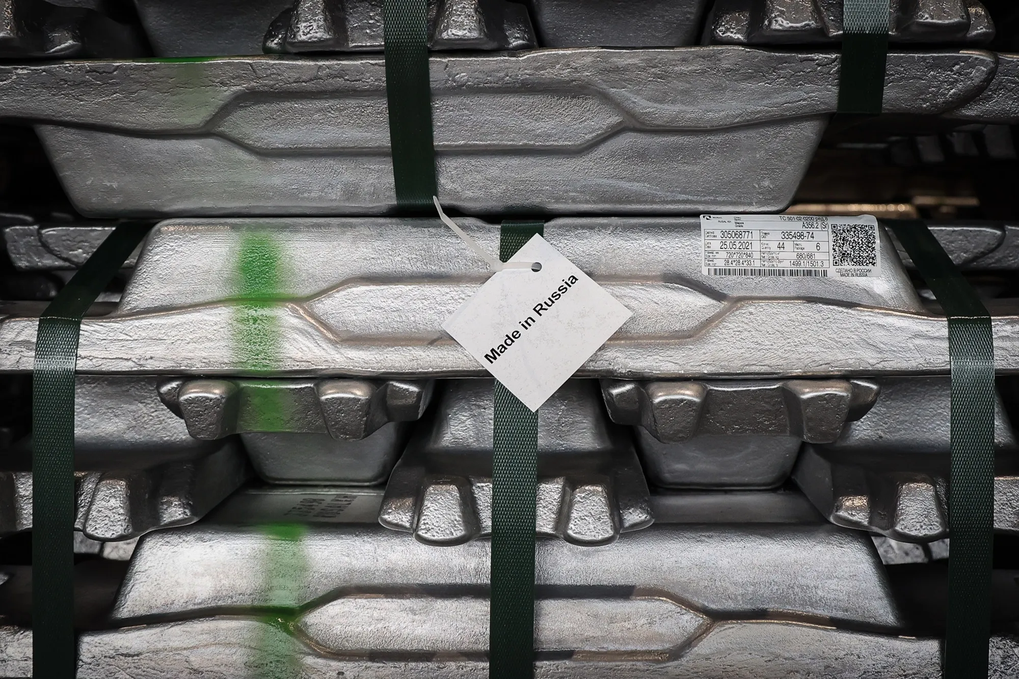 A 'Made in Russia' tag on a bound stack of aluminium ingots in the foundry at the Khakas aluminium smelter, operated by United Co. Rusal, in Sayanogorsk, Russia in May 2021.&nbsp;