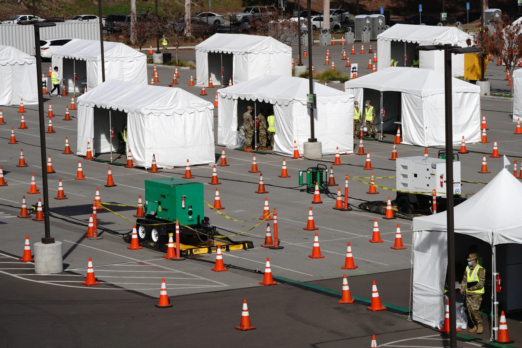 U.S. Army soldiers work at a mass vaccination site co-operated by the Federal Emergency Management Agency and Cal OES in East Los Angeles, on Feb. 16.