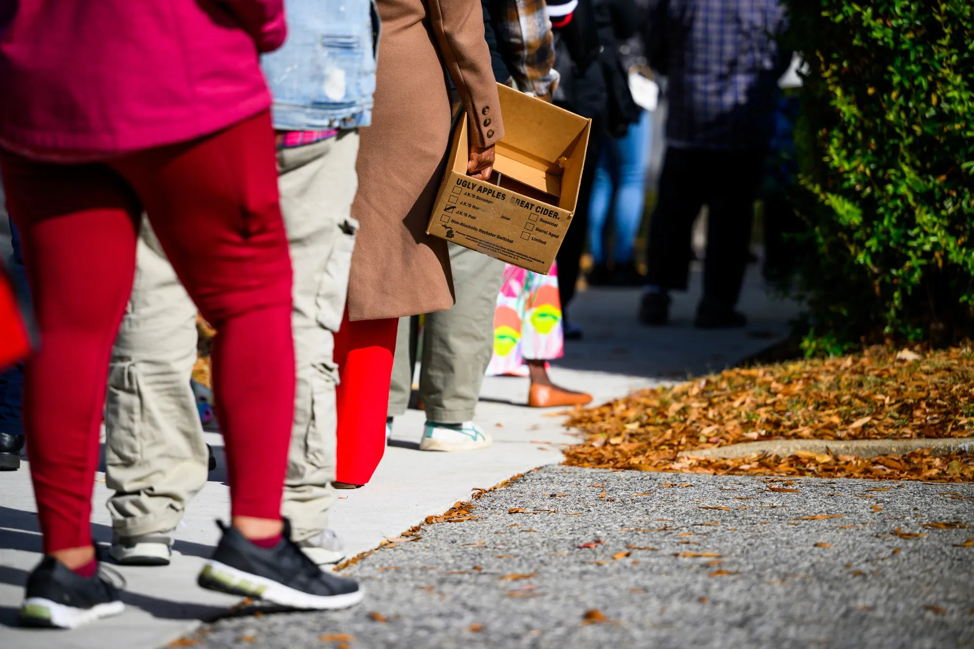 Furloughed federal workers wait in line at a food bank distribution site in Hyattsville, Maryland, on Nov. 4.