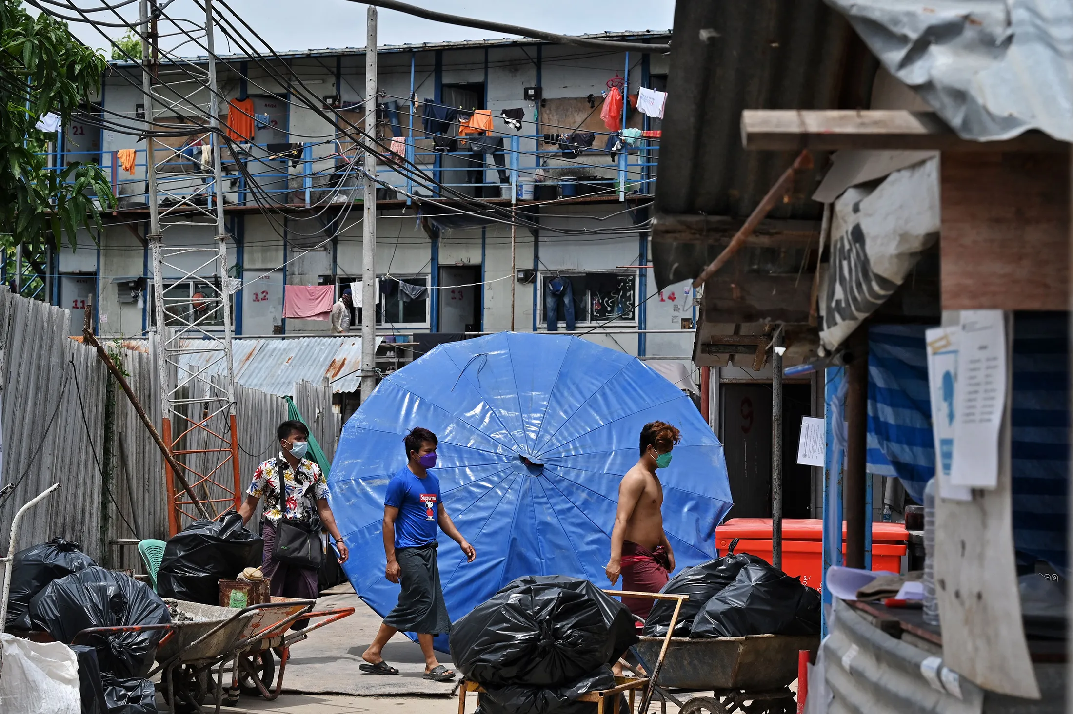 Inside a Thai and Myanmar construction workers camp in Bangkok earlier in June.