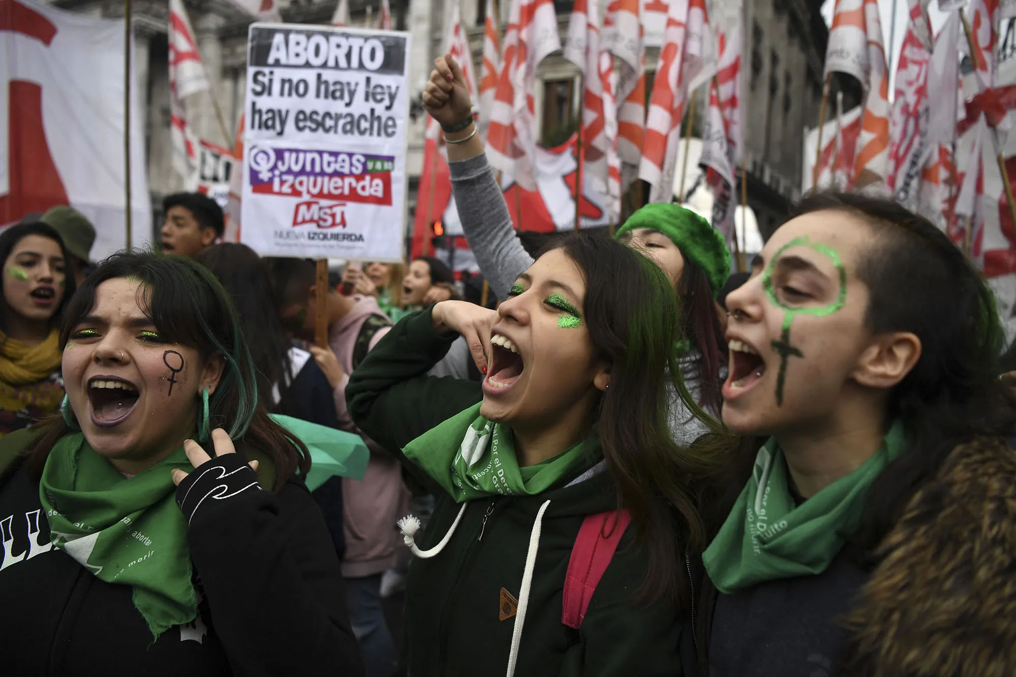 People demonstrate outside the National Congress in Buenos Aires on Aug. 8.