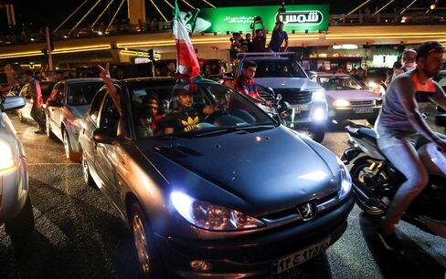 Iranian people celebrate the nuclear agreement in Tehran in July 2015.