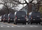 A fleet of Amazon vans take to the streets of Hicksville, New York, in March 2020. The pandemic triggered a boom in e-commerce deliveries, and cities are feeling the effects of freight vehicles on their streets.&nbsp;