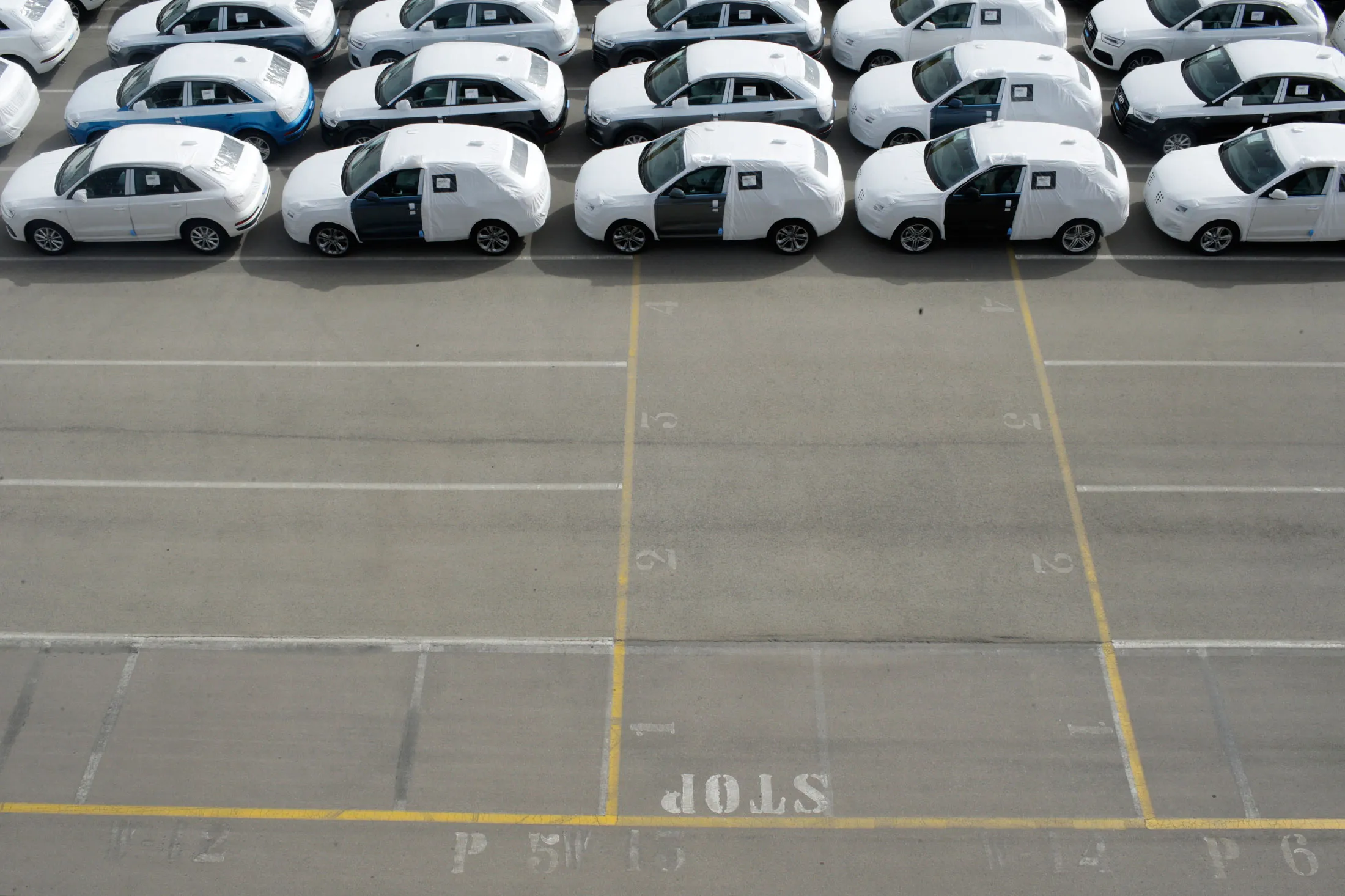 Protective wrapping covers new&nbsp;automobiles in Spain.&nbsp;