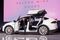 Elon Musk, chairman and chief executive officer of Tesla Motors, exits the Model X sport-utility vehicle during an event on Sept. 29, 2015.
