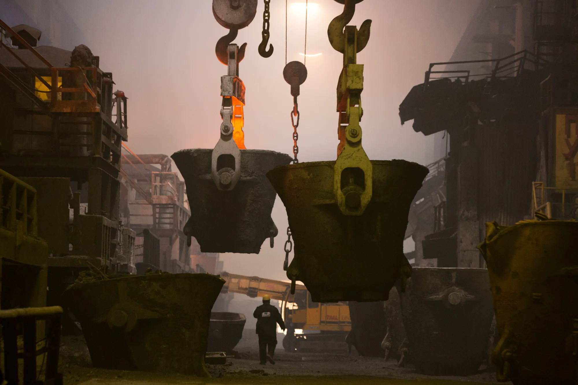 A worker monitors furnaces at the MMC Norilsk Nickel PJSC copper refinery in Norilsk, Russia, on Thursday, Oct. 19, 2017. Norilsk Nickel, which mines the rich deposits of nickel, copper and palladium near Norilsk, has spent 2.5 billion rubles ($40 million) to lay fiber-optic cabling in the Siberian tundra.