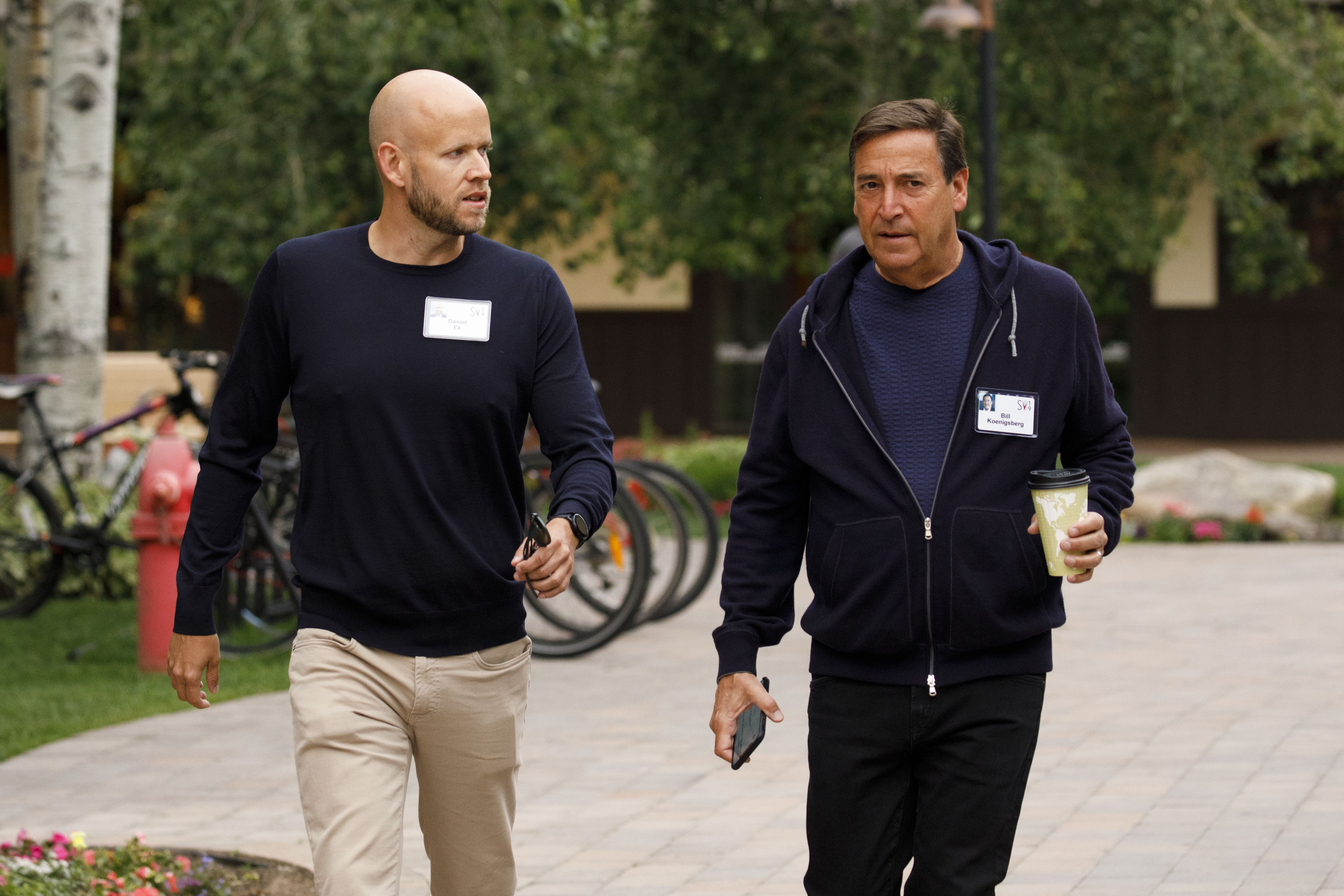 Daniel Ek, co-founder and chief executive officer of Spotify Technology SA, left, and Bill Koenigsberg, founder and chief executive officer of Horizon Media Inc., arrive for the morning session of the Allen & Co. Media and Technology Conference in Sun Valley, Idaho, U.S., on Wednesday, July 10, 2019. The 36th annual event gathers many of America's wealthiest and most powerful people in media, technology, and sports.