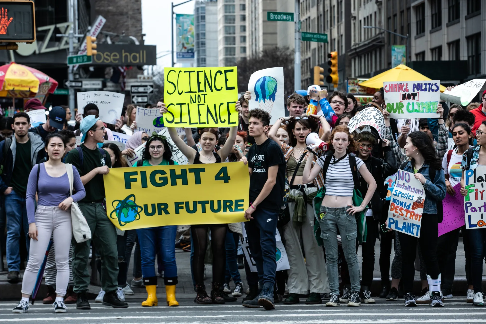 Demonstrators hold signs during a&nbsp;U.S. Youth Climate Strike in New York, U.S.