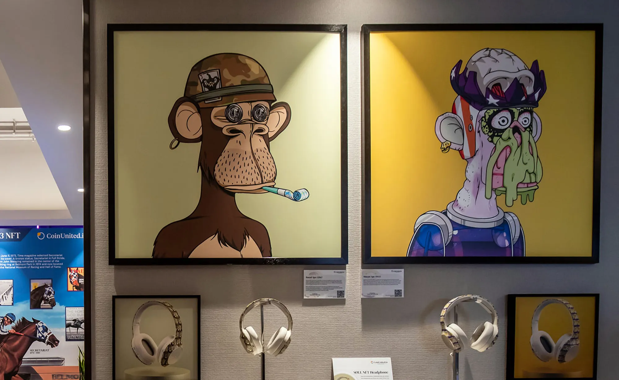 The physical artwork of "Bored Ape #2967" created by Bored Ape Yacht Club, left, and "Mutant Ape #1933" created by Mutant Ape Yacht Club, both available for sale as an NFT, displayed at a cryptocurrency exchange in Hong Kong.