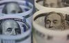 Japanese 10,000 yen, left, and U.S. 100 dollar banknotes are arranged for a photograph in Tokyo, Japan, on Monday, June 20, 2016.