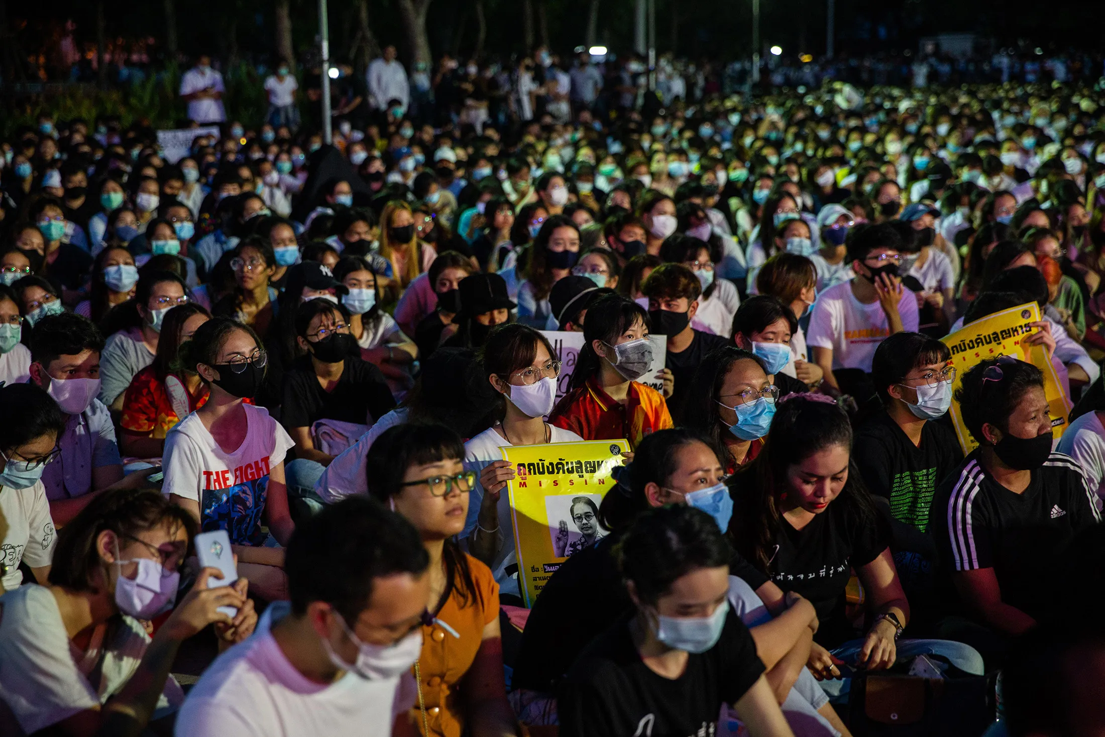 People attend an anti-government protest at Thammasat University in Bangkok on Aug. 10.