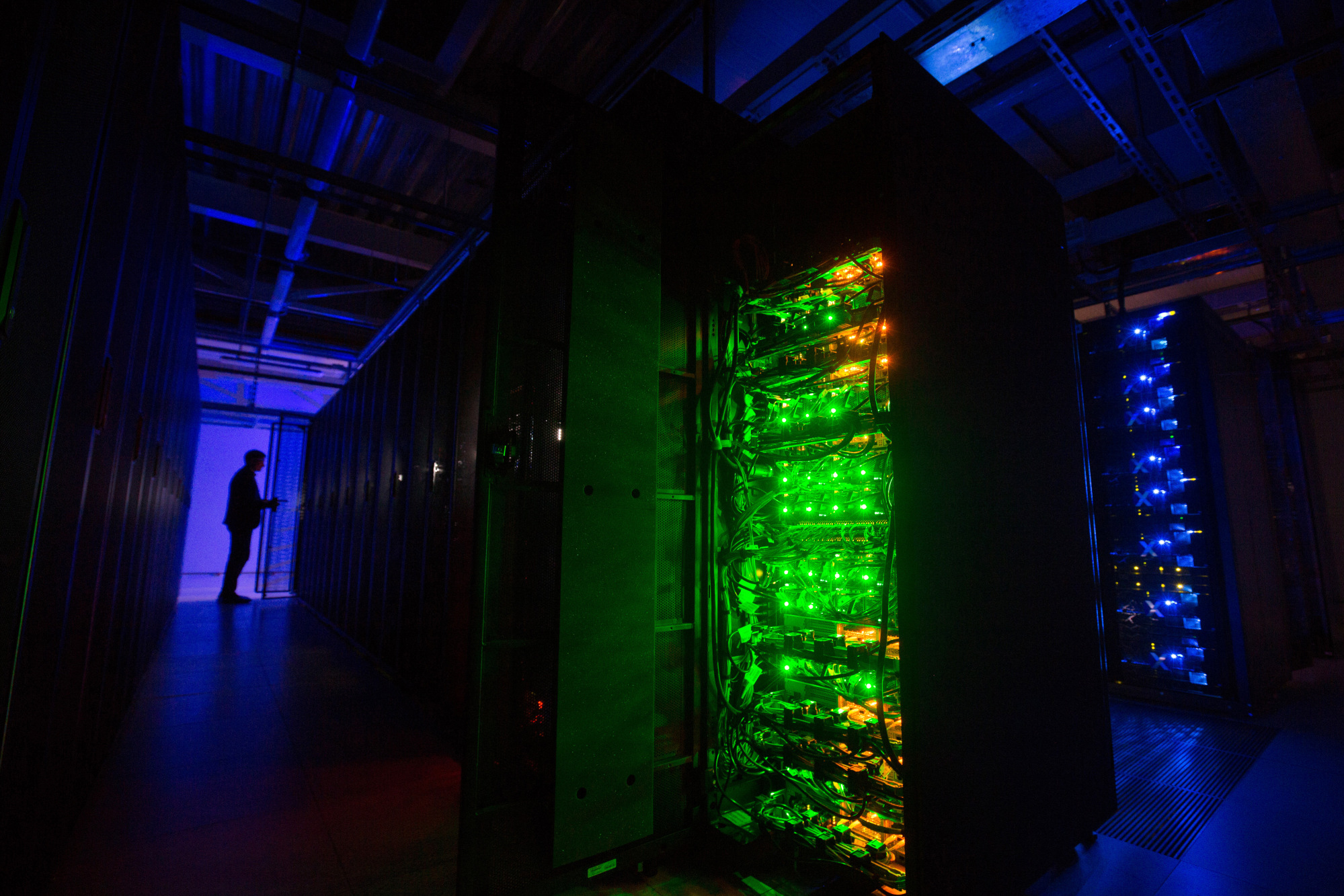 Lights illuminate racks of servers and data storage banks in the Sberbank PJSC data processing center (DPC) at the Skolkovo Innovation Center, in Moscow, Russia, on Tuesday, Dec. 26, 2017.&nbsp;