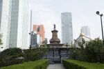 A temporary statue of a woman placed where a statue of Christopher Columbus once stood, ahead of a protest on the International Day for the Elimination of Violence Against Women in Mexico City&nbsp;on Thursday, Nov. 25, 2021.&nbsp;