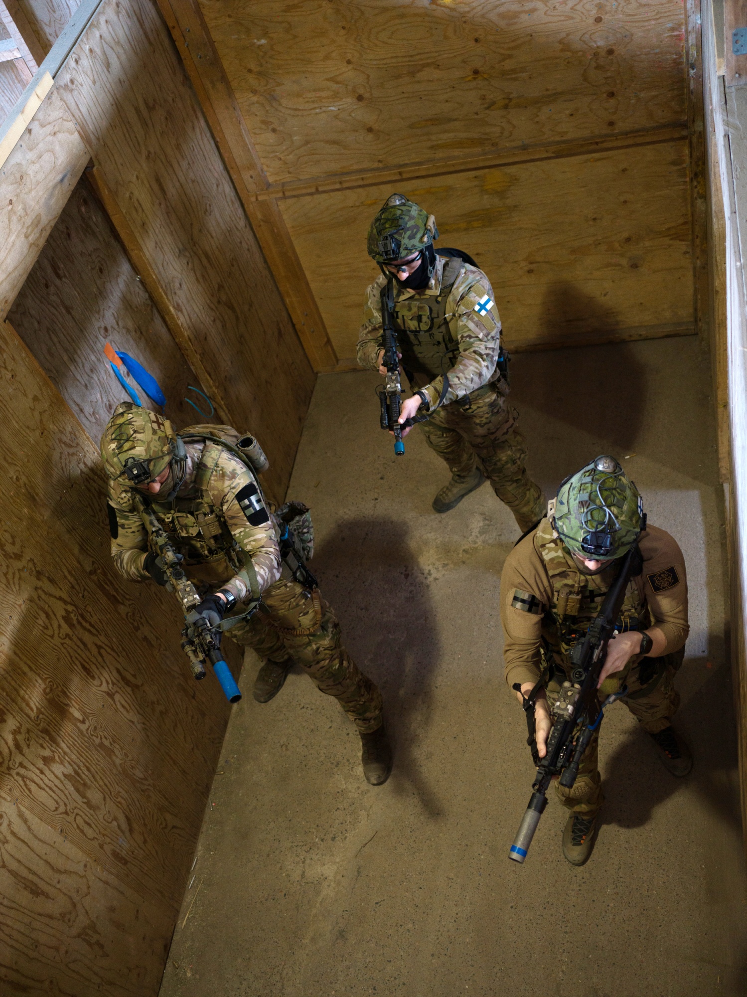 Finnish special forces operators demonstrate urban-combat tactics for participants in Finland’s National Defence Course at Santahamina military base in Helsinki.