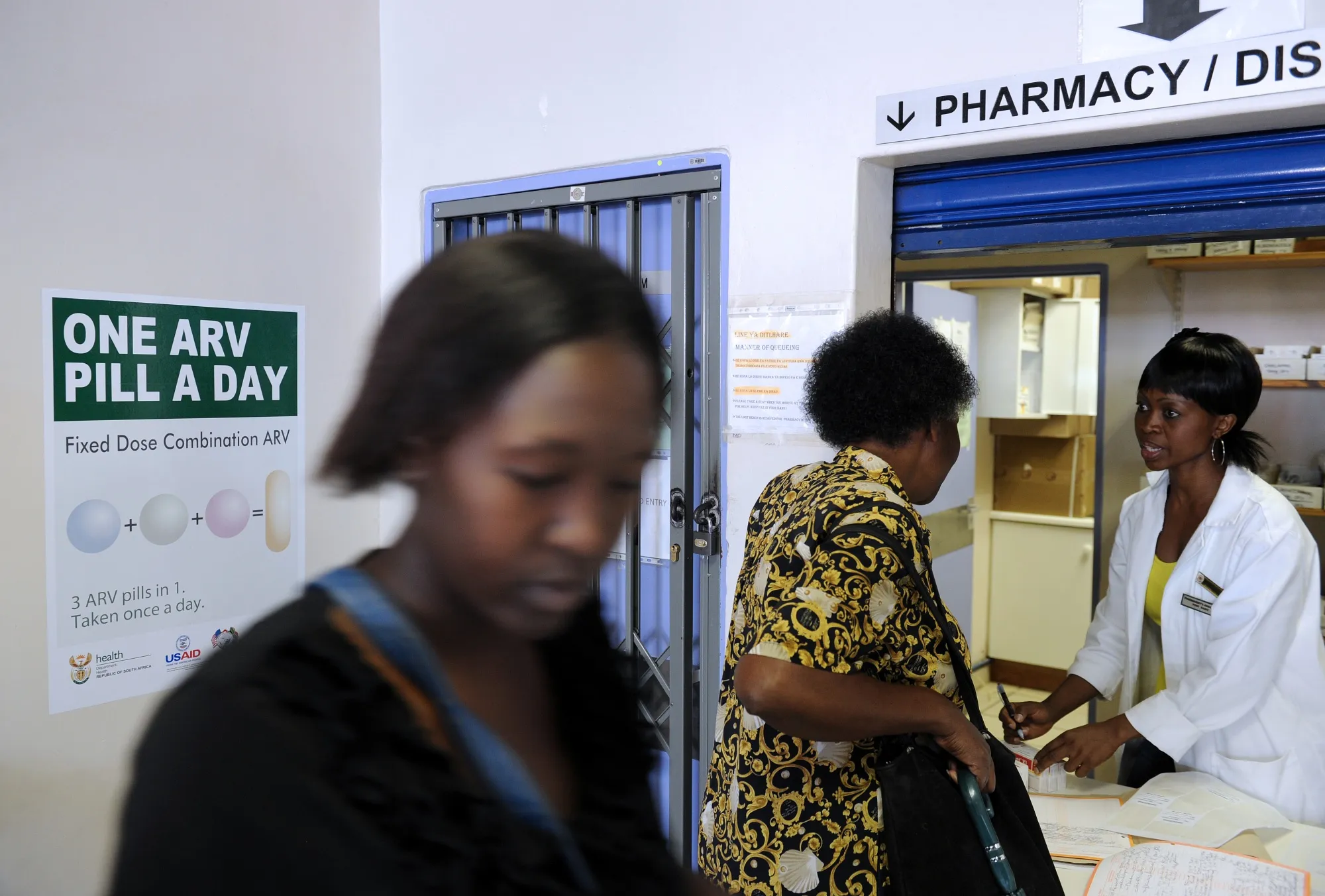 A woman queues at a clinic during the launch of an anti-AIDs drug in South Africa.