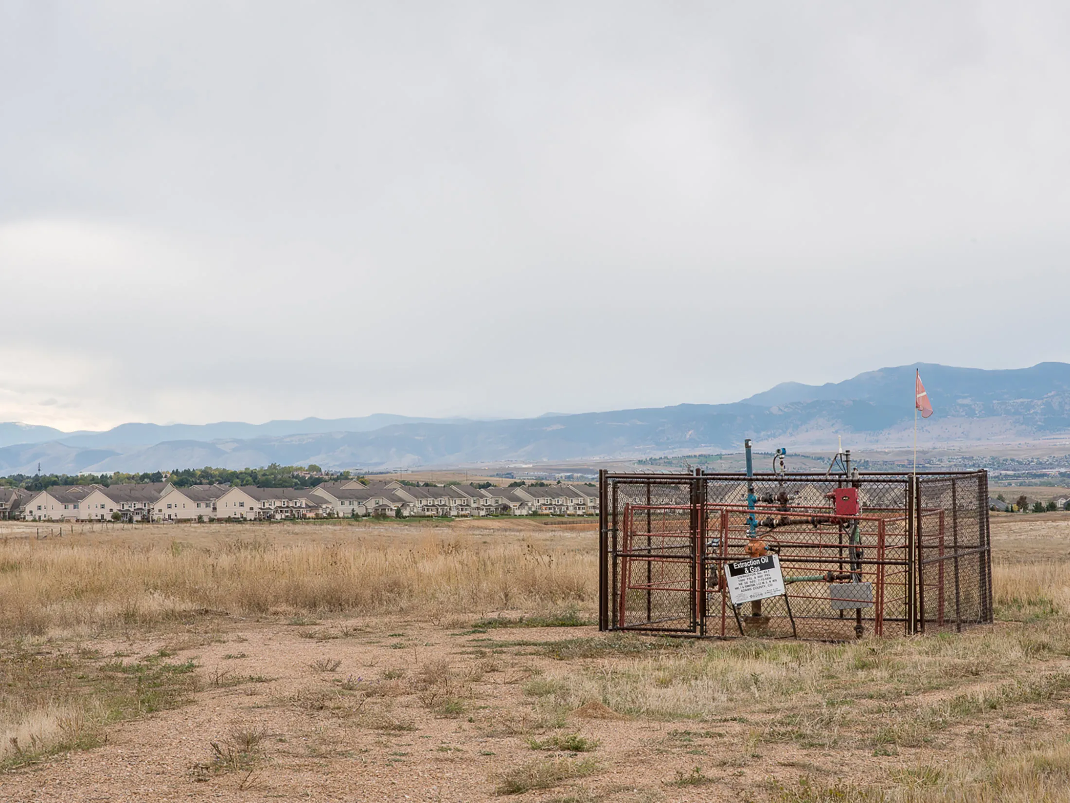 North of Denver, suburbia meets an oil and gas field.