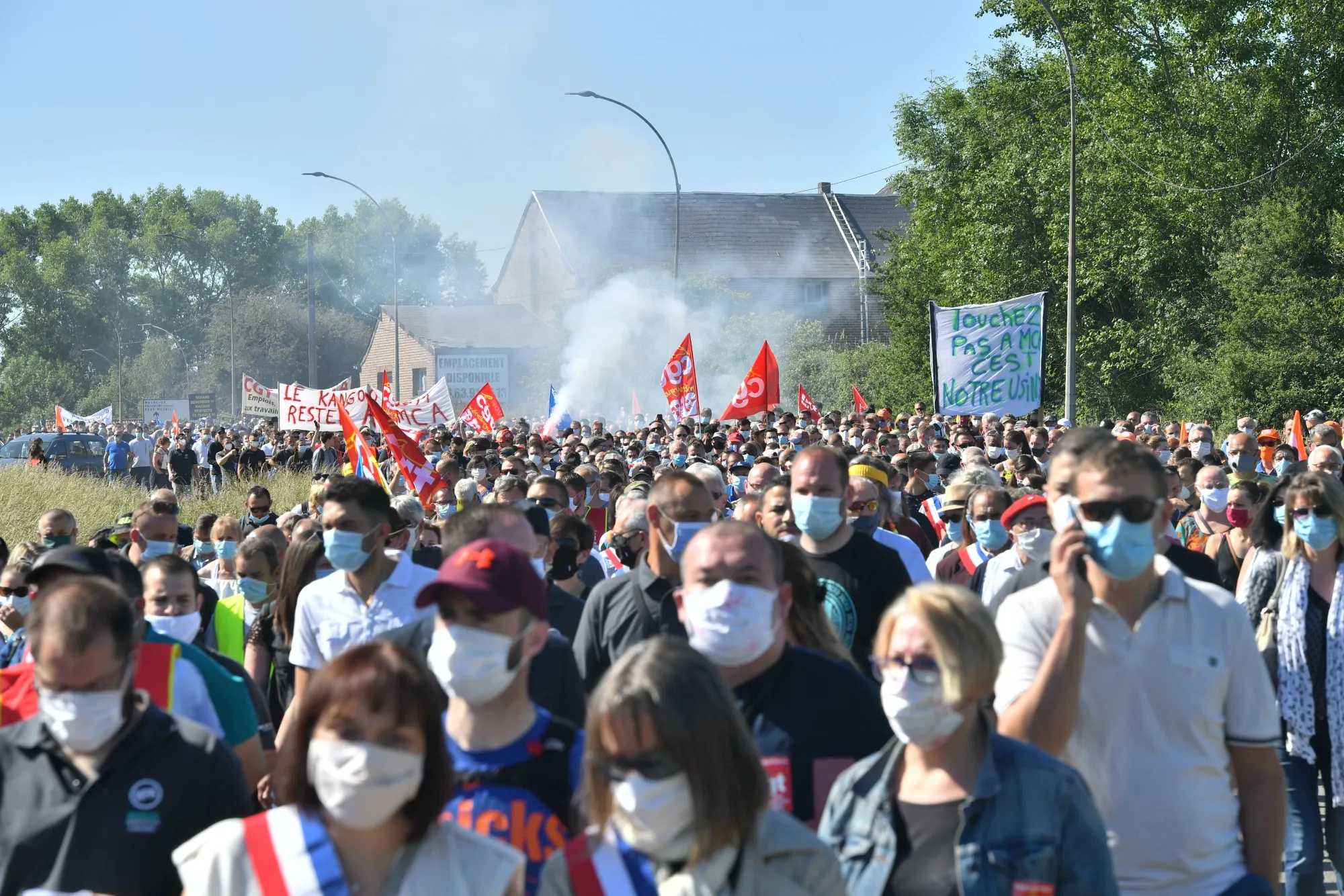 Workers and union members protest outside the Renault SA auto plant in Maubeuge, on May 30.