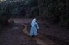 A nun visits the site after a Vale dam burst in Brumadinho, Brazil.