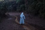 A nun visits the site after a Vale dam burst in Brumadinho, Brazil.