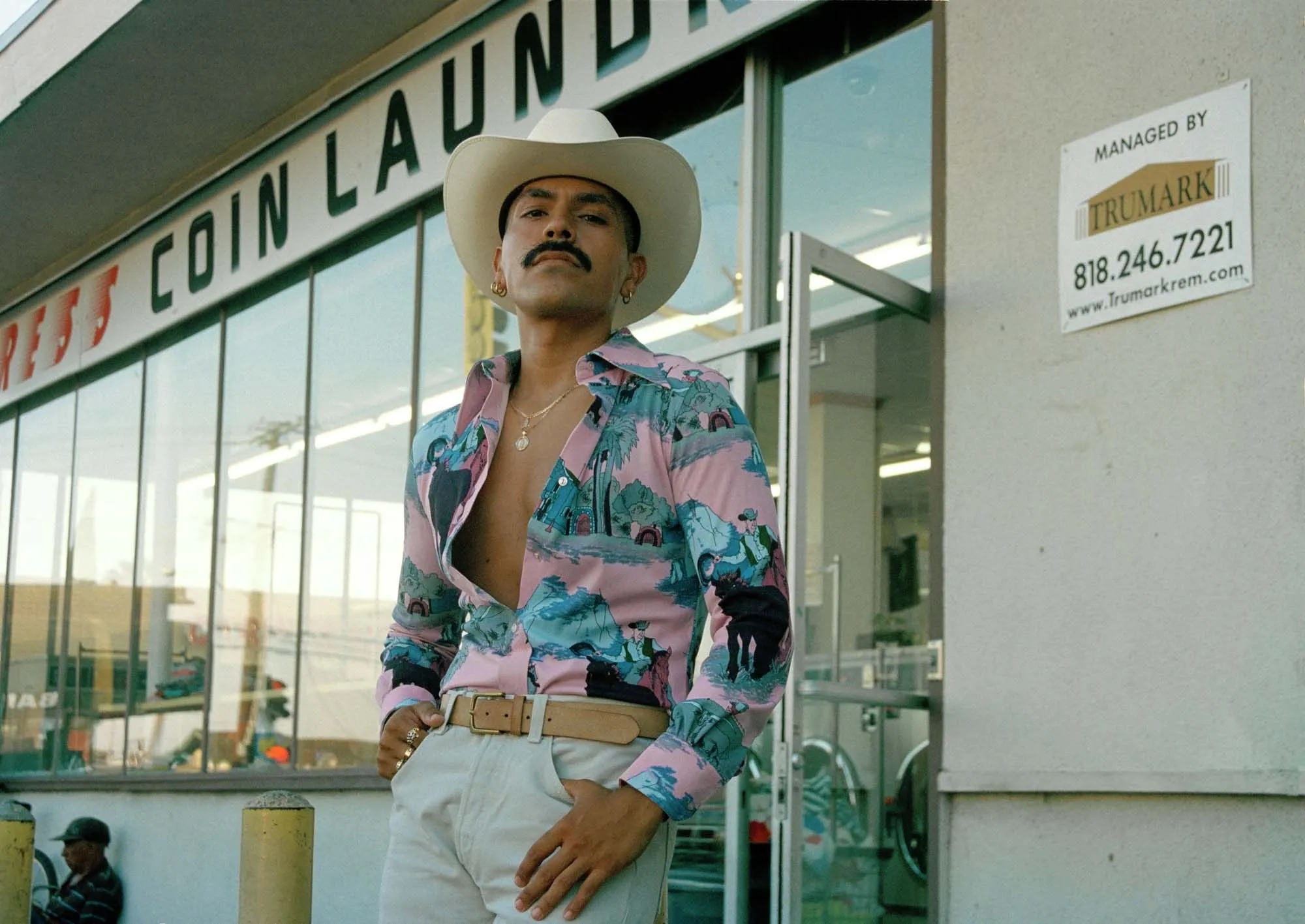 “Jose in Front of Laundromat, Lynwood, CA,” from the series Queer Brown Ranchero, 2017.