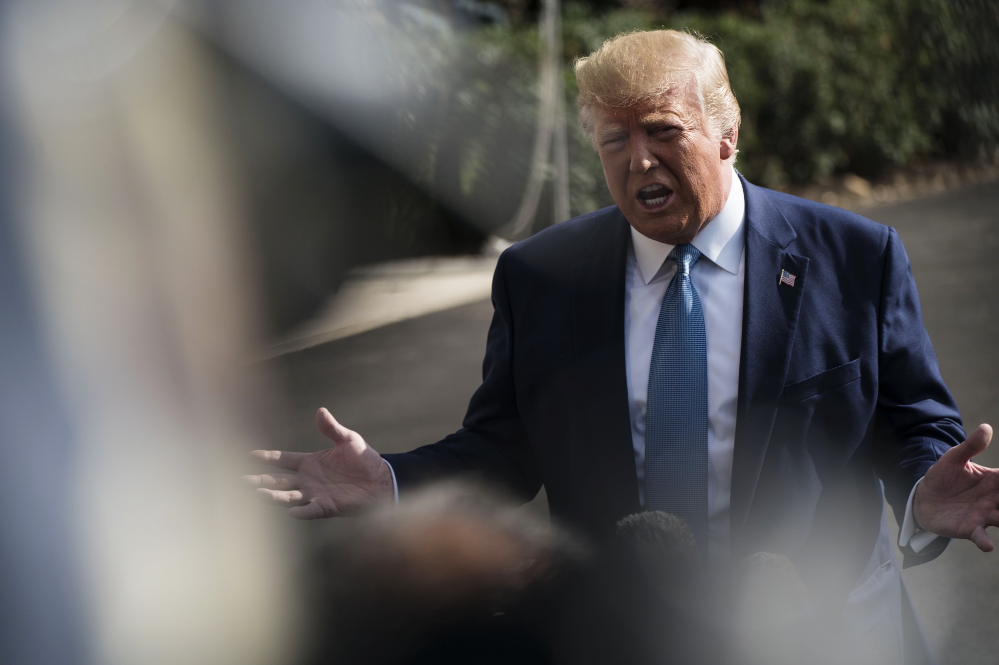 President Donald Trump speaks to members of the media outside of the White House in Washington on Oct. 4, 2019.&nbsp;