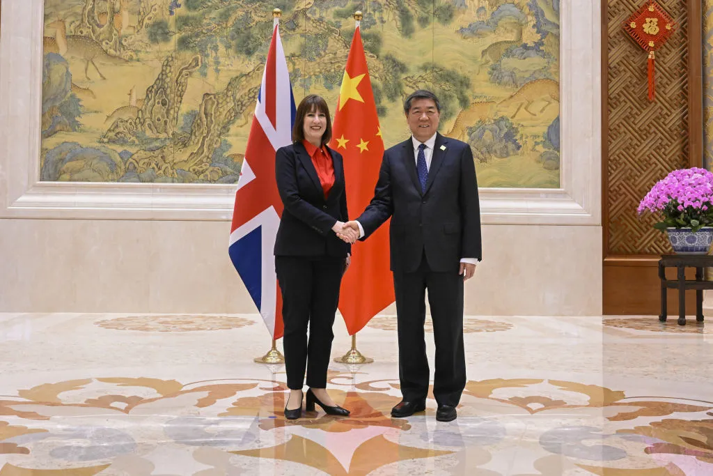 Rachel Reeves, UK chancellor of the exchequer, left, shakes hands with He Lifeng, China's vice premier, in Beijing on Jan. 11, 2025.