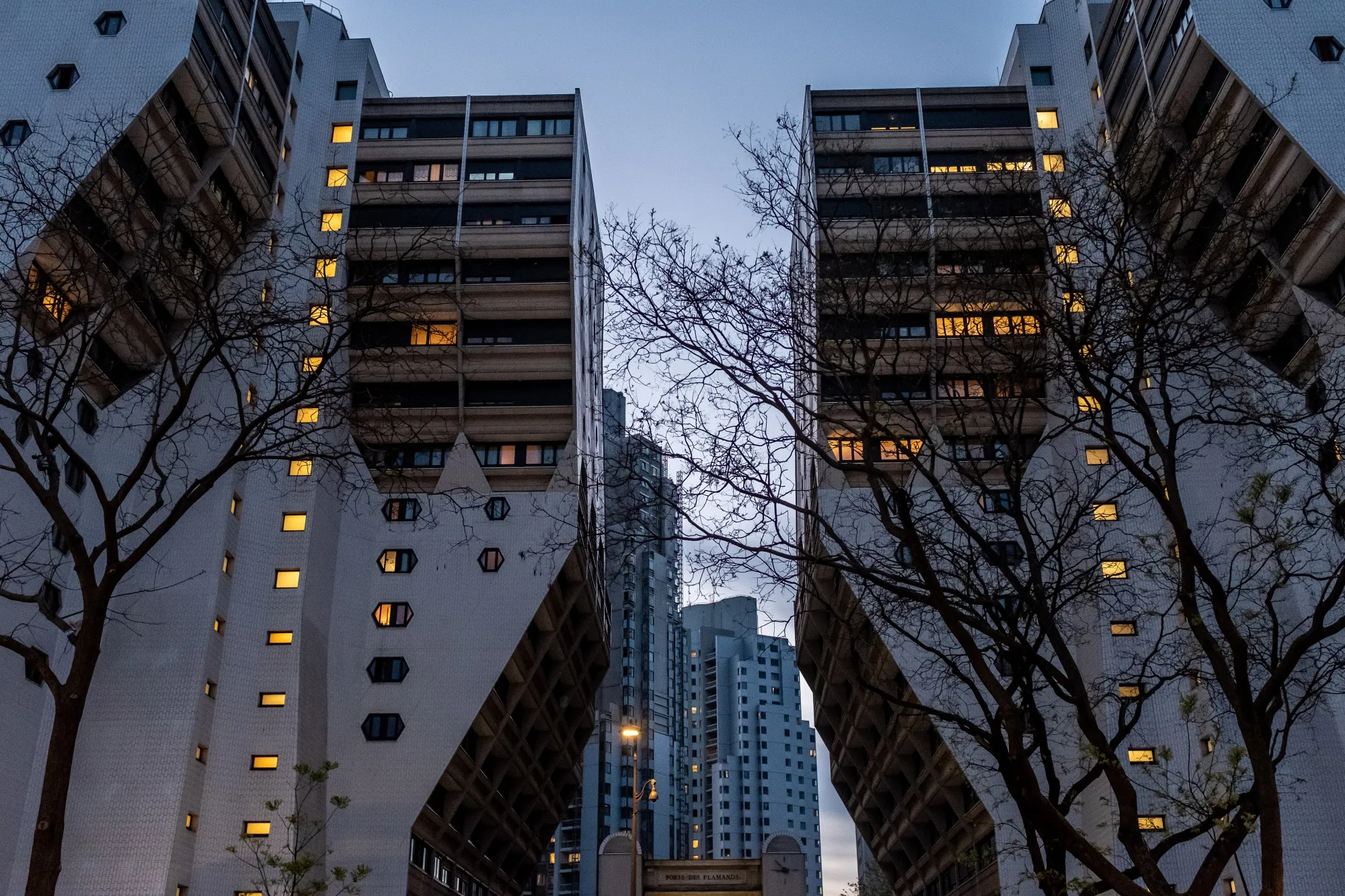 Illuminated apartments in residential tower blocks in Paris.