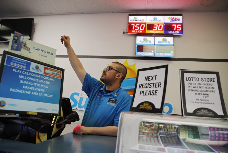 A cashier working in a lottery store in California, where the minimum wage is now $11 an hour, or $12 an hour for companies with more than 25 employees.
